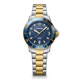 W Wenger watch with blue face and two-tone metal strap on white background