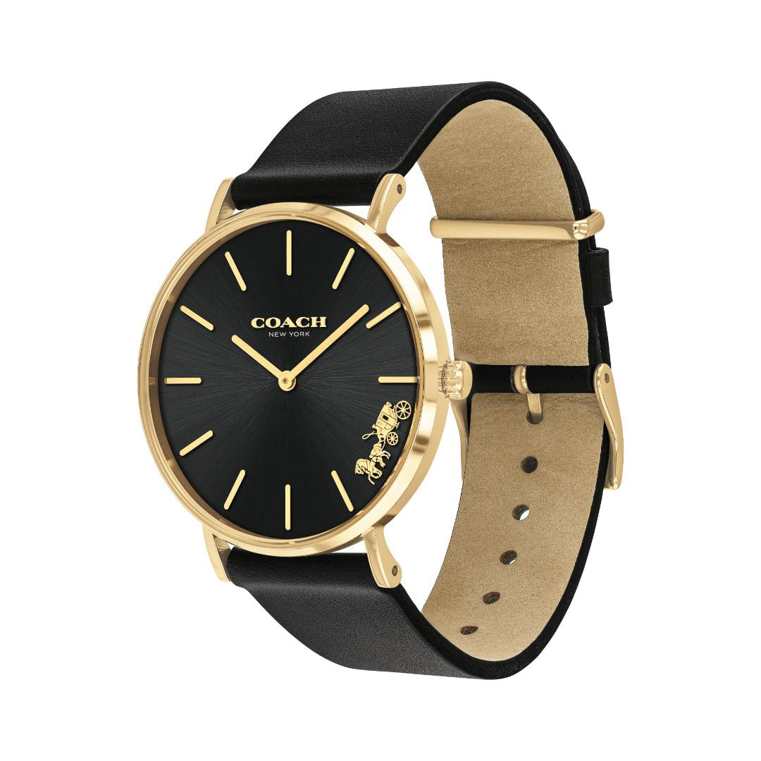 A Coach wristwatch with a black dial, gold-tone case, and a black leather strap with a tan interior, shown on a plain white background.
