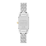 The back view of a Coach women's watch with a silver stainless steel case and link bracelet, featuring a small gold crown accent.