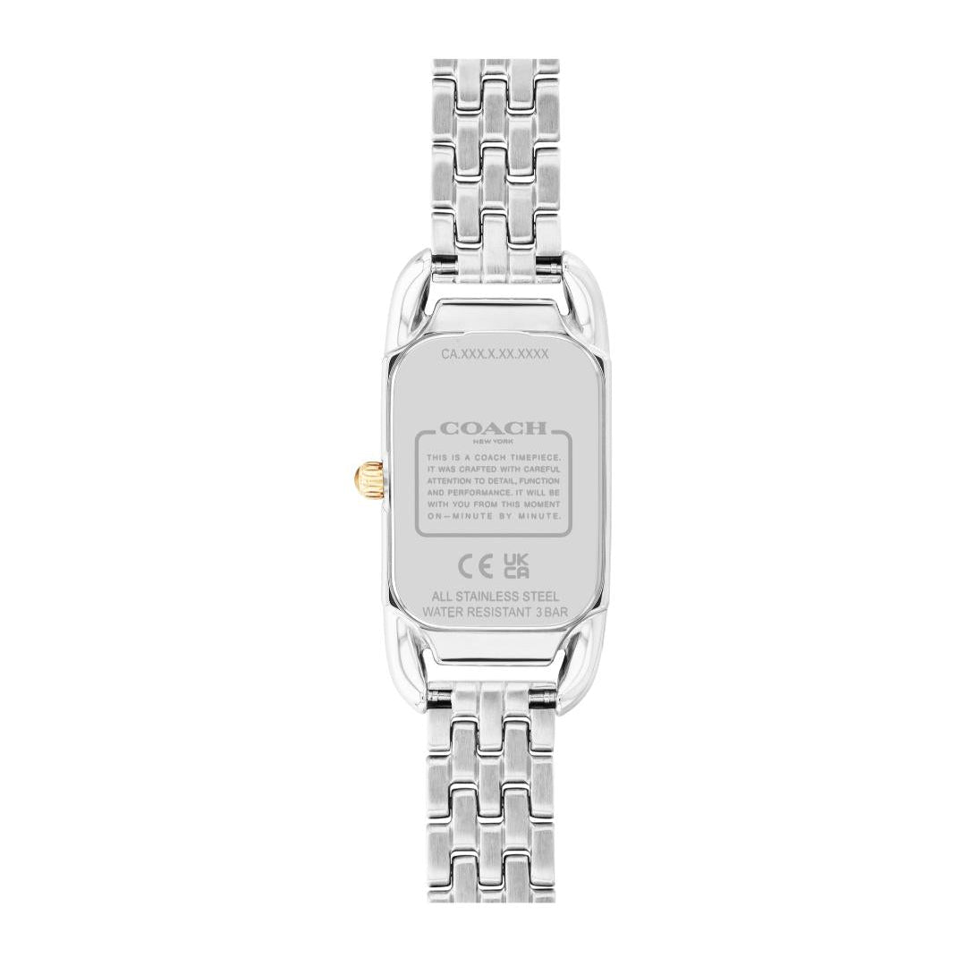 The back view of a Coach women's watch with a silver stainless steel case and link bracelet, featuring a small gold crown accent.