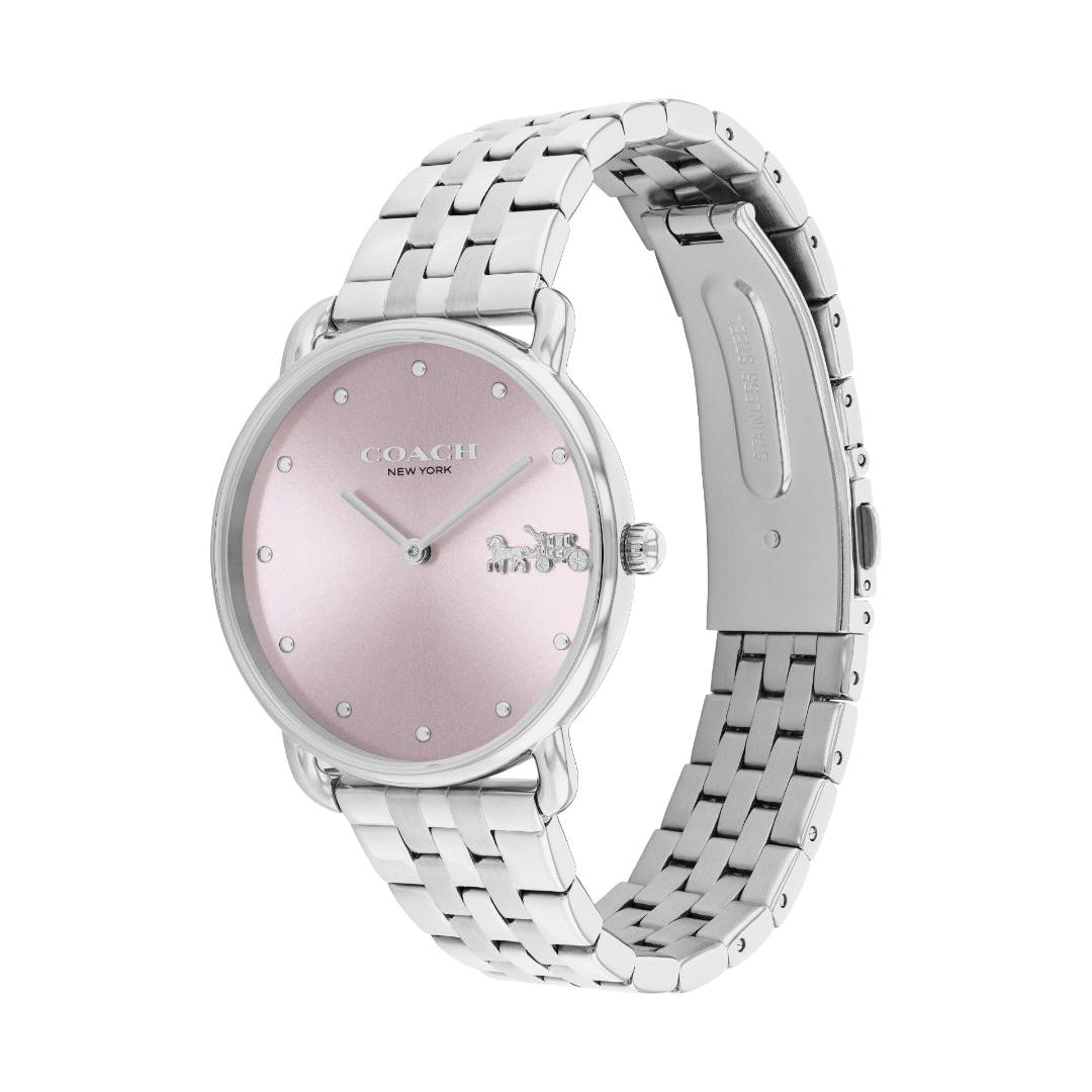 A Coach New York wristwatch with a silver-tone metal link bracelet and a pale pink dial, shown on a plain white background.