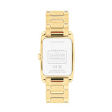 Gold-tone Coach women's watch shown from the back, featuring a rectangular case and integrated metal link bracelet on a plain white background.