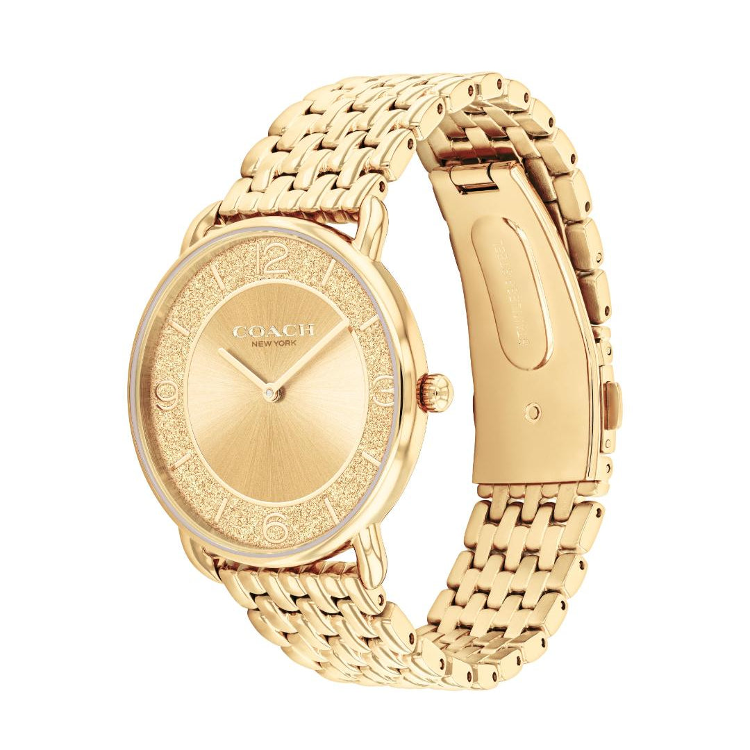 A gold-tone Coach wristwatch with a matching metal link bracelet, shown on a plain white background.