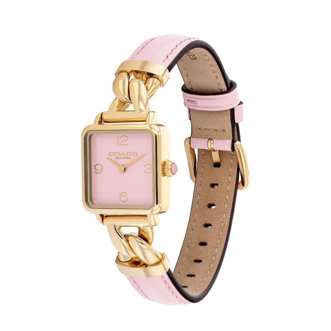 A Coach women's watch featuring a light pink dial, a gold-tone square case, and a light pink leather strap with gold-tone chain links and a tan interior.