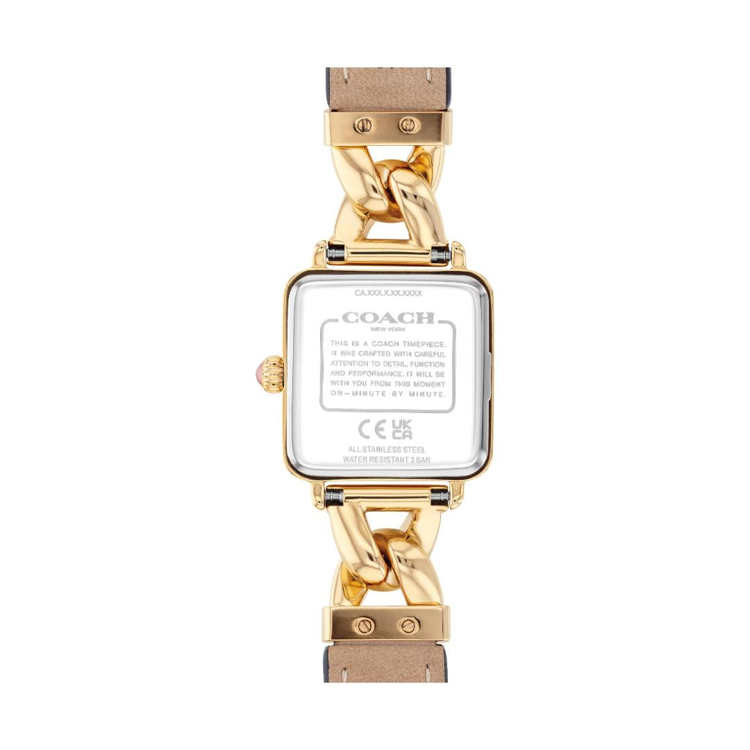 The back view of a Coach women's watch featuring a gold-tone case, a chunky gold-tone chain link band, and a white dial showing technical specifications.