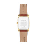 The back view of a Coach wristwatch with a gold-tone case and a brown leather strap featuring white stitching and Coach branding.