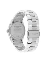 A silver stainless steel Coach wristwatch shown from the back, featuring a metal link bracelet and a brushed metal case with brand text engraved on the back.