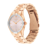 A Gucci women's watch featuring a rose gold metal bracelet, a two-tone silver and rose gold case, and a pale pink dial with diamond hour markers.