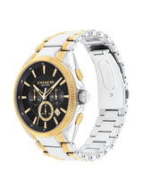 A Coach New York men's two-tone watch with a black dial, black bezel, and a silver and gold-tone stainless steel link bracelet, shown on a white background.
