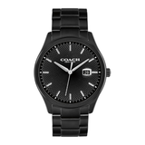 A Coach New York men's analog watch with a black metal case and link bracelet, featuring a textured black dial with silver-tone hands and a date window at 3 o'clock.