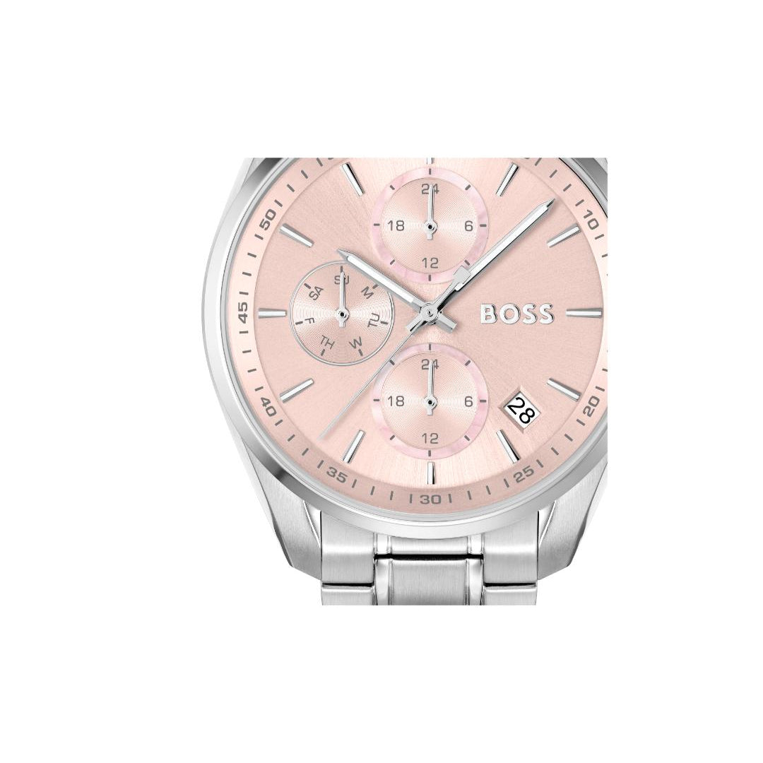 A Hugo Boss analog watch with a light pink dial and a silver-tone stainless steel case and link bracelet, shown against a plain white background.
