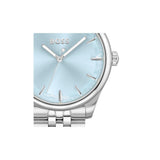 A close-up of a Hugo Boss watch with a light blue dial and a silver stainless steel case and bracelet, shown against a plain white background.