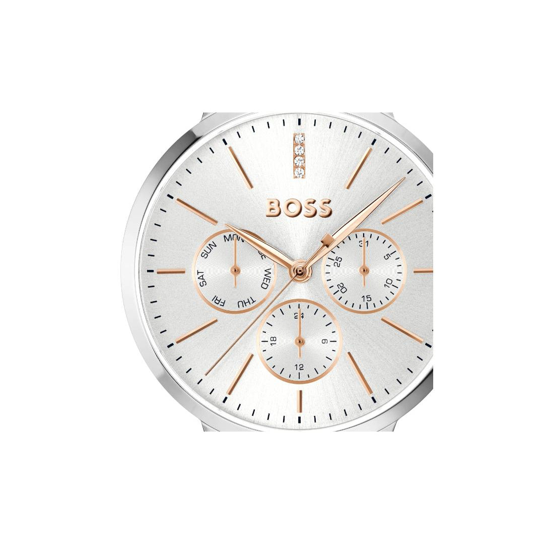 BOSS watch with a silver-toned round case, white dial, and rose gold accents, including the brand name and hands.