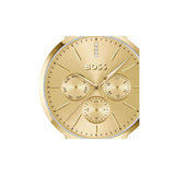 A gold-tone BOSS watch with a round dial, three subdials, and gold hands and markers, shown against a plain white background.