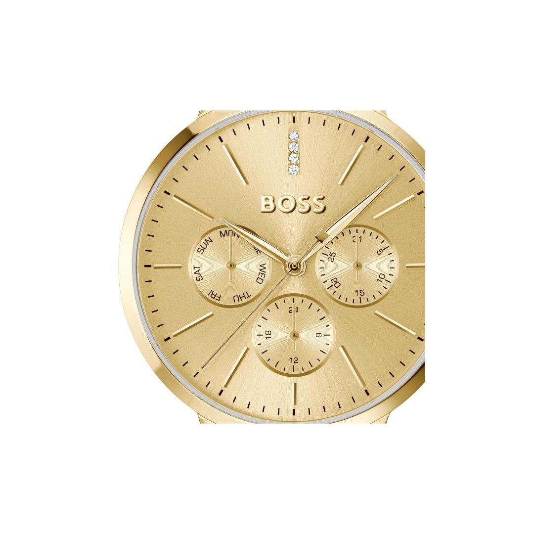A gold-tone BOSS watch with a round dial, three subdials, and gold hands and markers, shown against a plain white background.