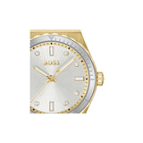 A close-up of a Hugo Boss watch with a gold-tone case, silver-tone bezel, and a silver dial with gold hands and hour markers.
