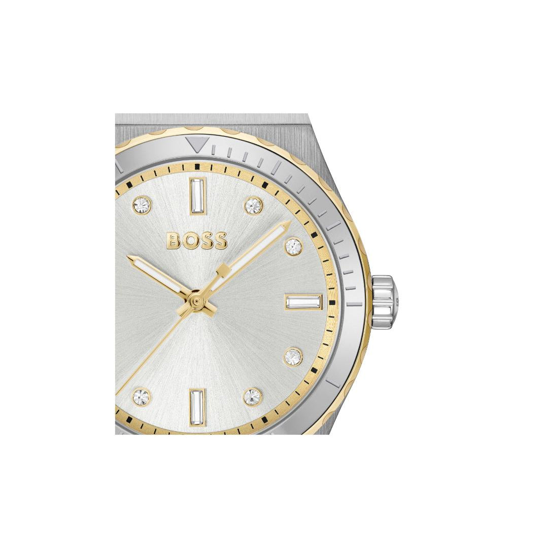 A Hugo Boss men's watch featuring a two-tone silver and gold stainless steel case, a silver dial with gold hands and markers, and crystal hour markers.