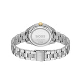 The back view of a silver stainless steel watch with a matching metal link bracelet, featuring a gold crown accent and a BOSS logo on the case back, set against a plain white background.