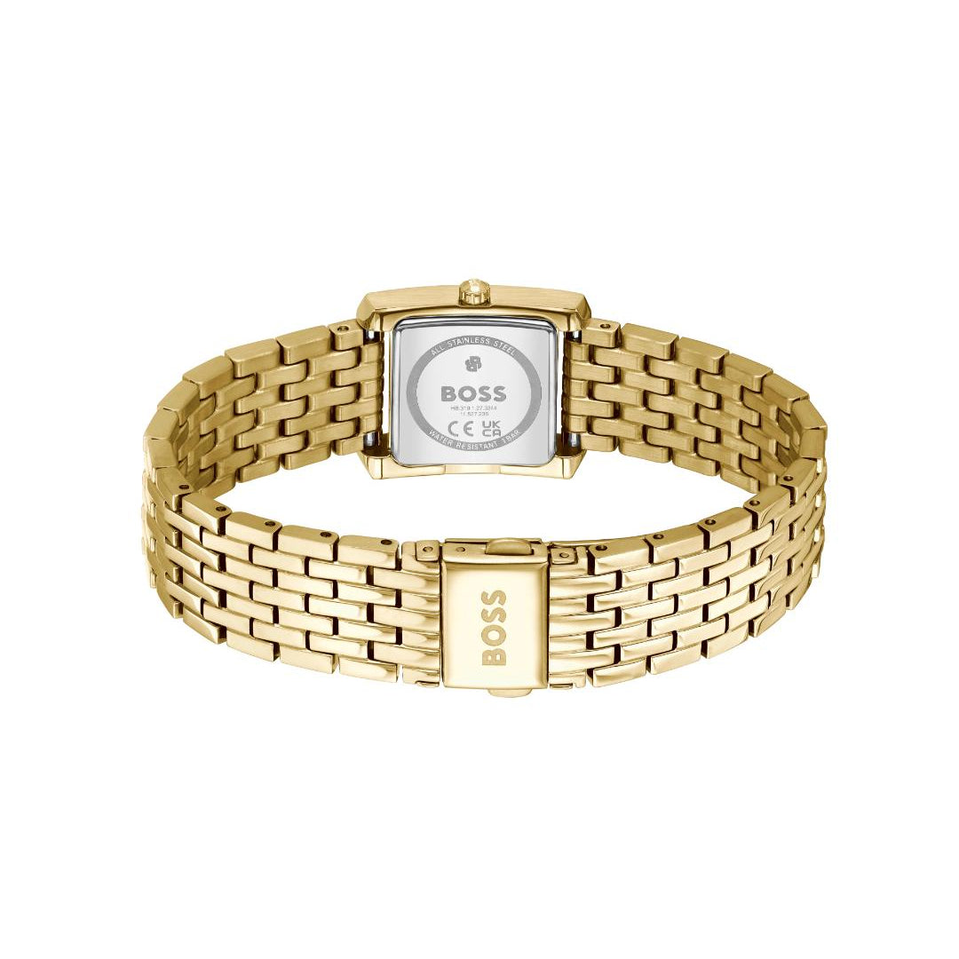 Gold watch with visible brand logo on a white background
