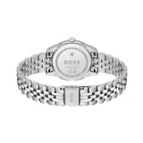 A BOSS women's watch featuring a round silver-tone stainless steel case, a bezel encrusted with clear rhinestones, and a pale pink mother-of-pearl dial with silver-tone hands and Roman numeral XII.