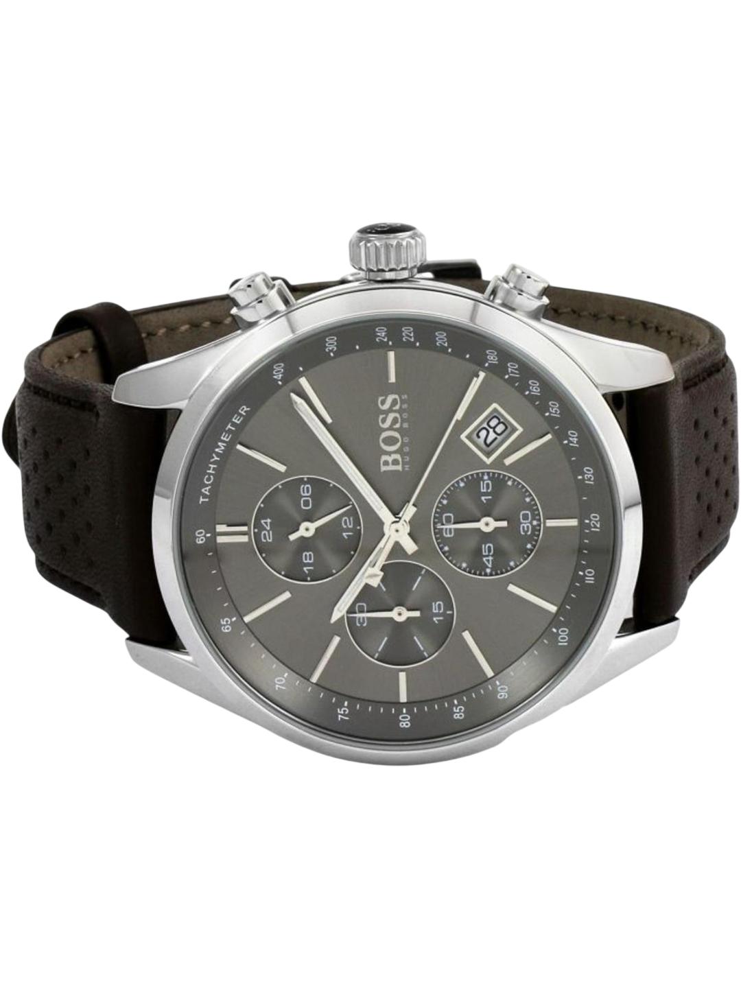 Hugo Boss chronograph watch with a silver-tone case, dark gray dial, and brown perforated leather strap on a white background.