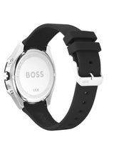 A HUGO BOSS smartwatch shown from the back, featuring a black silicone strap and a silver-tone case with a white back cover.