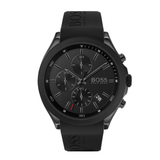 A Hugo Boss chronograph watch with a round black case, black textured dial, and black rubber strap, shown against a plain white background.