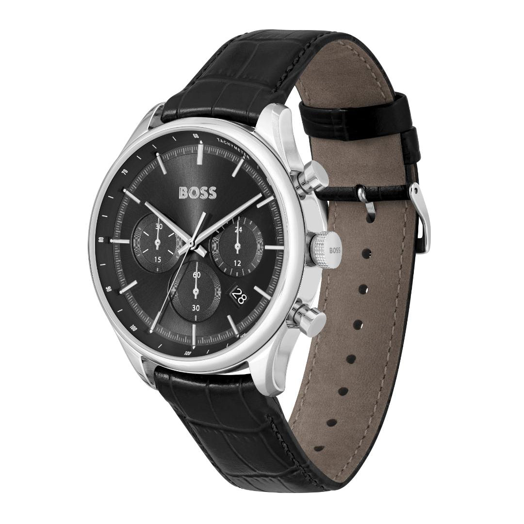 A Hugo Boss analog watch with a black dial, silver-tone case, and a black leather strap with a brown interior, shown on a plain white background.