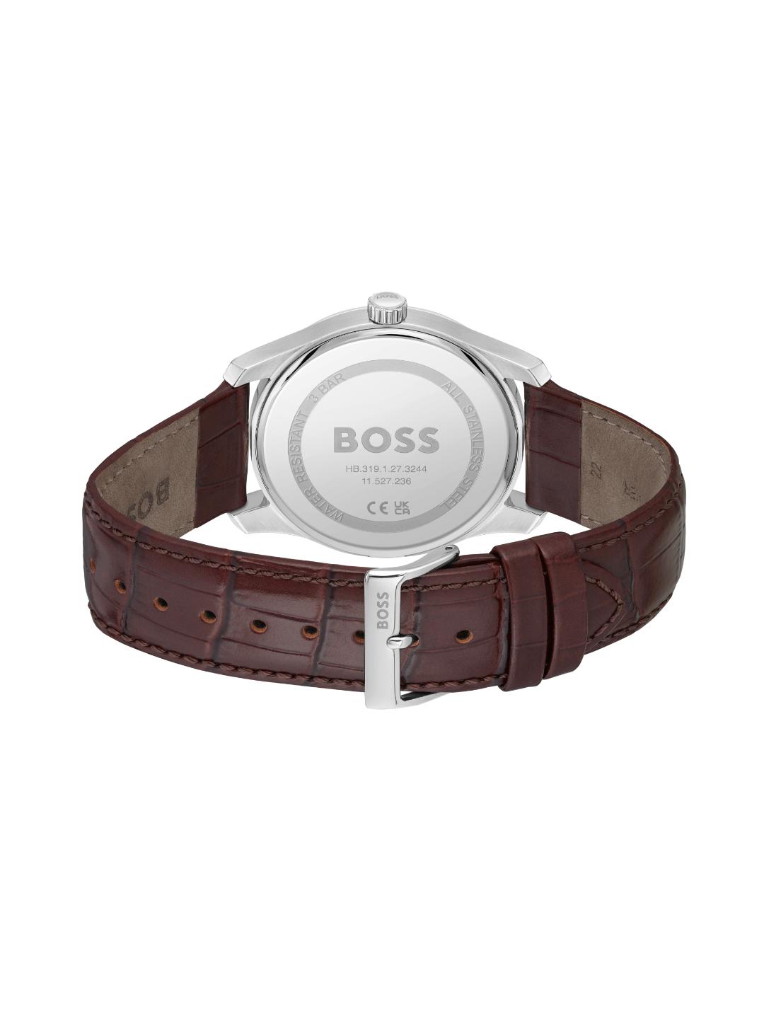 The back view of a HUGO BOSS watch with a brown leather strap and a silver stainless steel case, showing the engraved BOSS logo on the back.