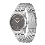 A Hugo Boss stainless steel watch with a textured dark gray dial, gold-tone hands and Roman numeral hour markers, and a matching steel link bracelet, shown on a plain white background.