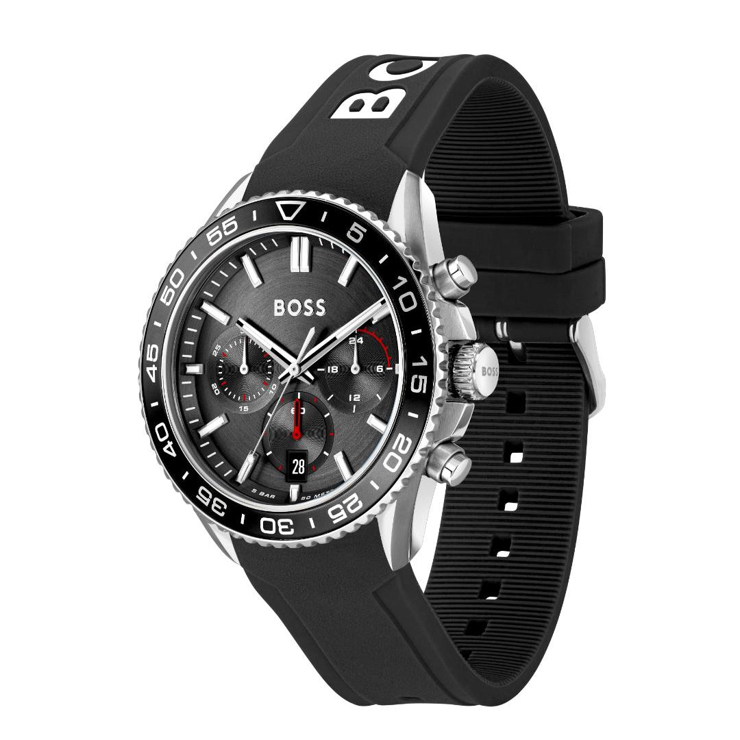 A Hugo Boss chronograph watch with a black rubber strap, black dial, and silver-tone case on a white background.