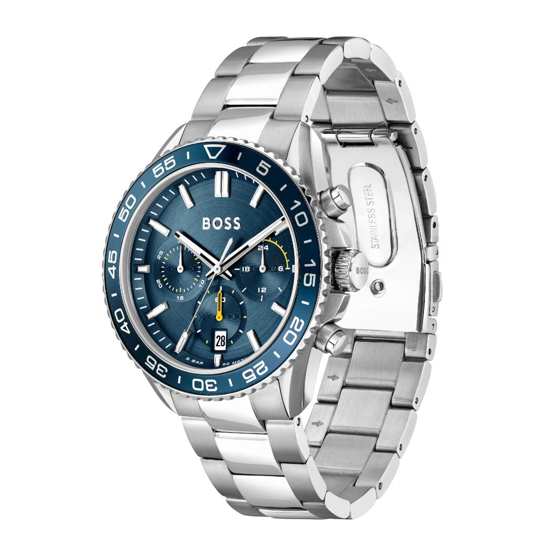 A Hugo Boss men's stainless steel watch with a blue dial, blue bezel, and silver link bracelet, shown on a plain white background.