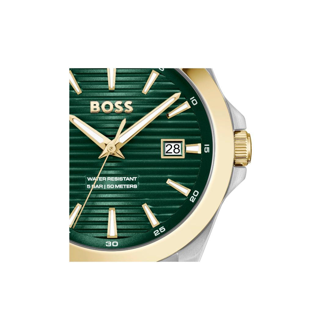 A close-up of a BOSS watch with a dark green dial, gold-tone hands and markers, a gold-tone bezel, and a silver-tone side case on a plain white background.