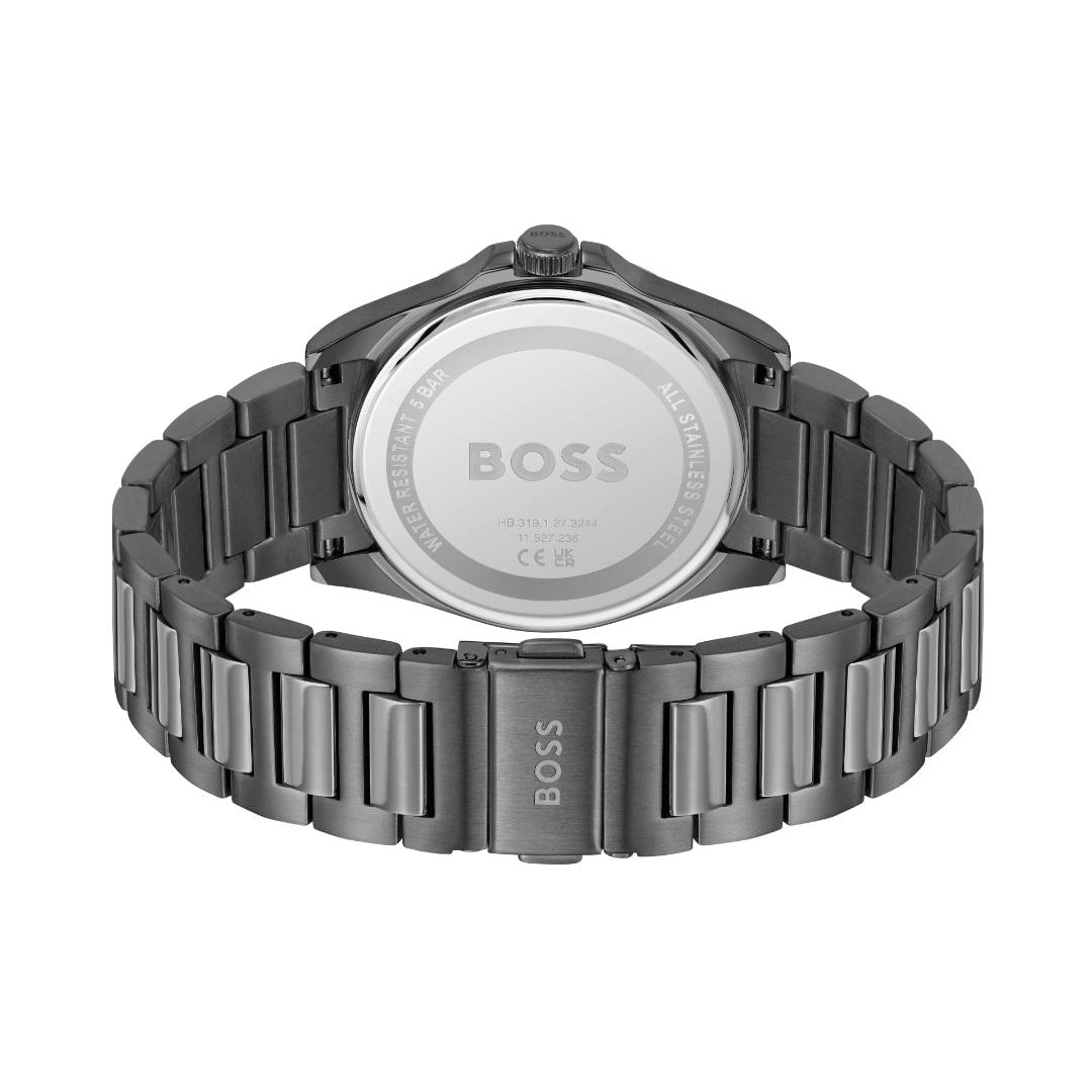 The back view of a BOSS watch with a dark gunmetal gray metal link bracelet and a matching dark gunmetal case, showing the brushed silver-toned case back engraved with the BOSS logo.