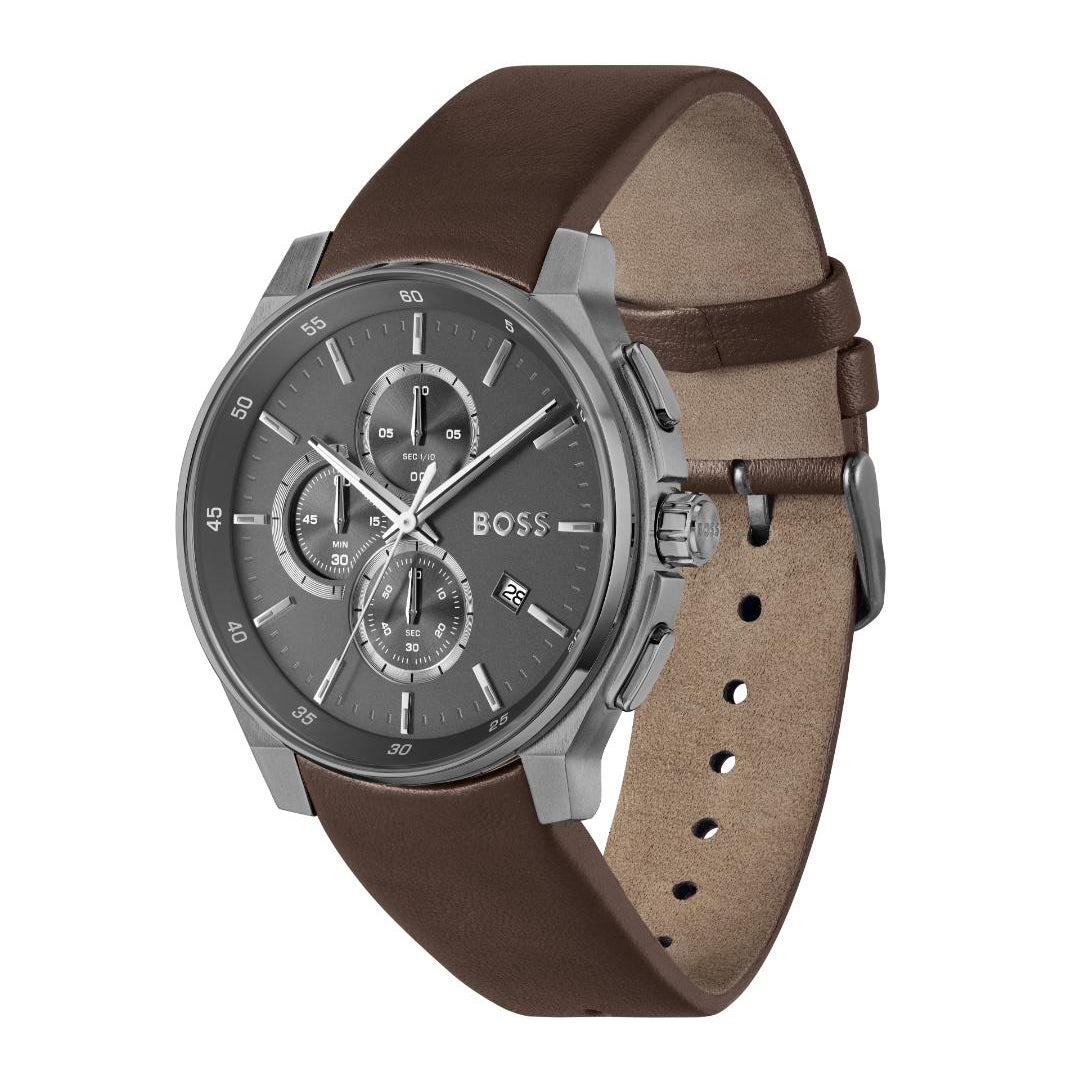 A Hugo Boss men's watch featuring a brown leather strap, a silver-toned case, and a dark gray dial with three subdials.