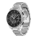 A silver stainless steel analog watch with a black dial, featuring multiple subdials, a date window, and a matching silver metal link bracelet. The BOSS logo is visible on the dial.