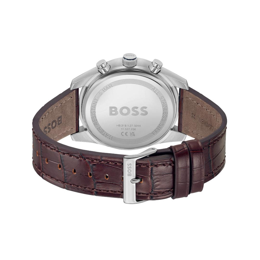 The back view of a Hugo Boss watch with a brown leather strap and a silver stainless steel case, showing the branded metal case back and crown details on a white background.