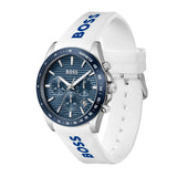 A Hugo Boss analog watch with a white textured silicone strap featuring blue 'BOSS' branding, a blue sunburst dial with three subdials, and a blue bezel.