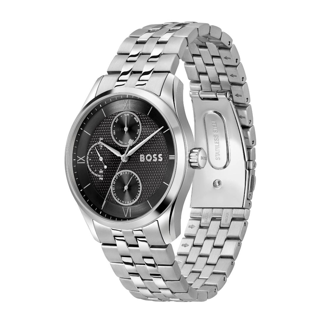 A Hugo Boss men's analog watch with a silver stainless steel link bracelet, a black dial with three subdials, and silver-tone case and clasp, shown on a plain white background.