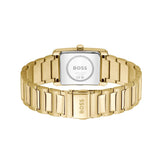 Gold-tone BOSS watch with a rectangular case and integrated metal link bracelet, shown from the back on a white background.