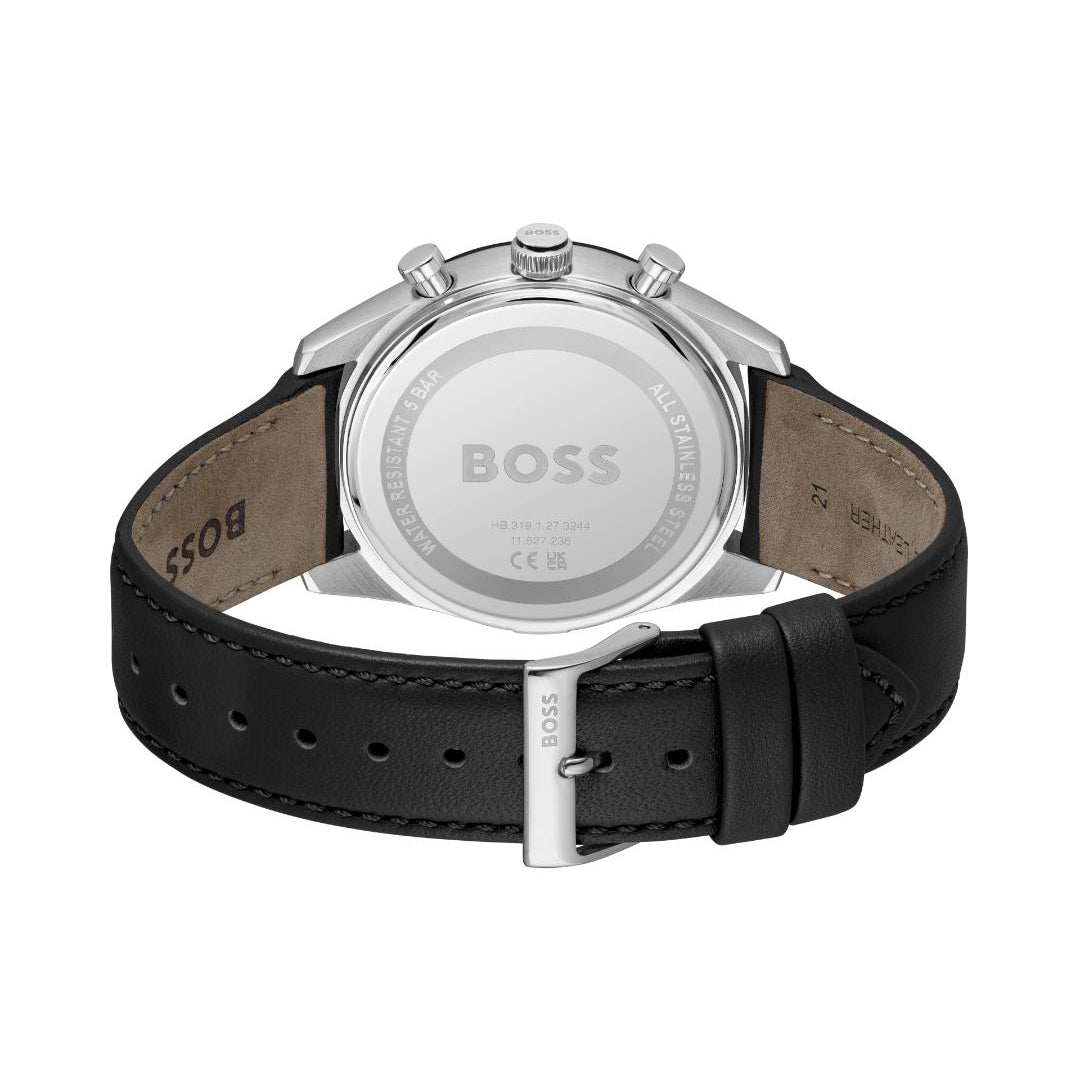 The back view of a Hugo Boss watch with a black leather strap and a silver-toned case, featuring the BOSS logo engraved on the back.