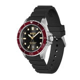 A Hugo Boss wristwatch with a black rubber strap, black dial, and a distinctive red bezel, shown on a plain white background.