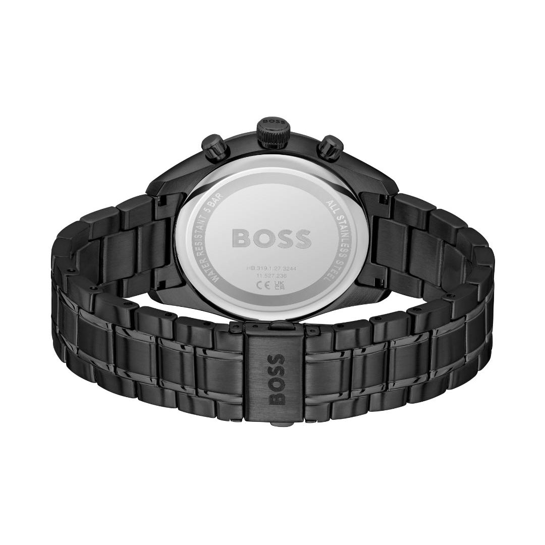Rear view of a BOSS watch with a black metal case and link bracelet, showing a silver-toned circular backplate with the BOSS logo.