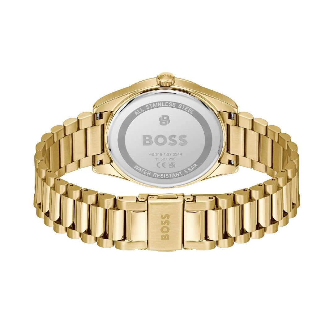 Gold-tone BOSS watch shown from the back, featuring a polished metal link bracelet and a circular case back engraved with the BOSS logo.