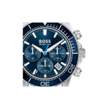 BOSS wristwatch with a dark blue dial, blue subdials, a blue tachymeter bezel, and a silver-tone stainless steel case.