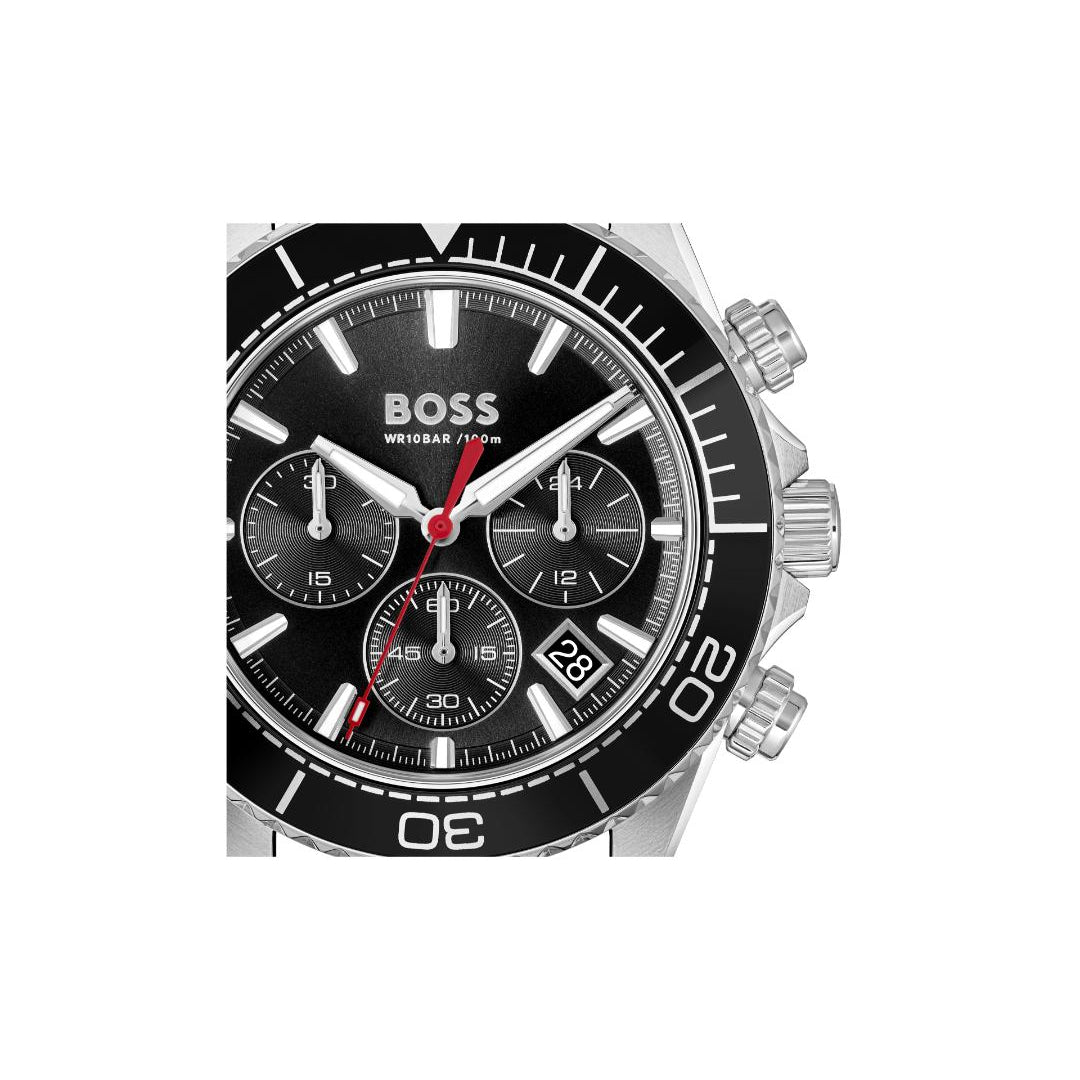 A Hugo Boss wristwatch with a black dial, black bezel, silver-tone case, and a red chronograph second hand, shown against a plain white background.