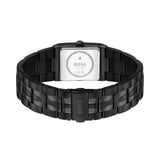 A black BOSS watch with a rectangular silver-tone case and a matching black metal link bracelet, shown from the back on a plain white background.