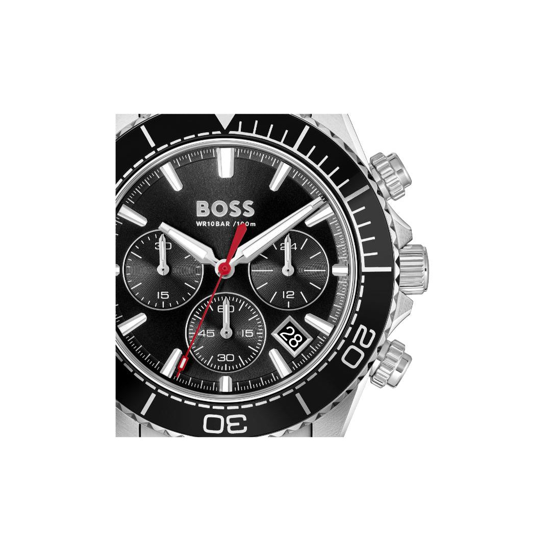 A Hugo Boss wristwatch with a black dial, black bezel, silver-tone case, and a red chronograph second hand, shown against a plain white background.