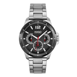 A Hugo brand men's analog watch with a silver stainless steel link bracelet, a black textured dial, and a black bezel with white and red details.