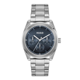 A Hugo brand stainless steel watch with a dark blue dial and silver metal case and link bracelet, shown against a plain white background.